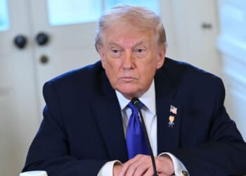 President Trump speaks during a meeting in the White House.
