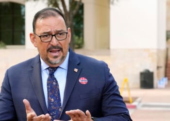 Arizona Secretary of State Adrian Fontes speaks during a news conference after voting on the first day of early in-person voting for the general election at Surprise City Hall on Oct. 9, 2024, in Surprise, Arizona.