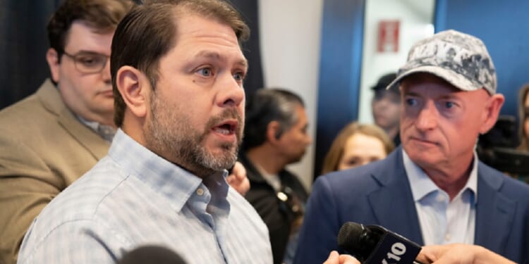 Arizona Democratic Sen. Ruben Gallego speaks to reporters in a March file photo.