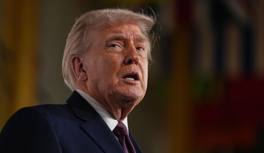 President Donald Trump arrives for the premiere of first lady Melania Trump's movie "Melania" at The John F. Kennedy Memorial Center For The Performing Arts, Thursday, Jan. 29, 2026, in Washington. (AP Photo/Allison Robbert)