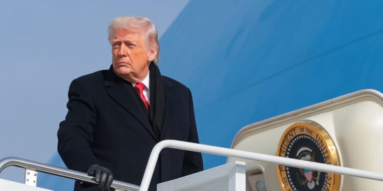 President Donald Trump boards Air Force One on Jan. 16, 2026, in Joint Base Andrews, Maryland.