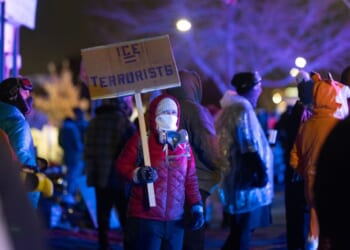 Anti-ICE protesters and agitators gather outside a federal building in Minneapolis, Minnesota, on Jan. 17, 2026.