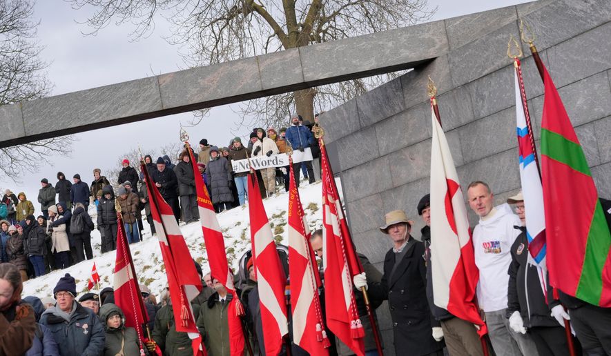 Hundreds of Danish veterans, many of whom fought alongside U.S. troops, stage a silent protest as they march" from Kastellet in Copenhagen to the American embassy in Copenhagen on Saturday, Jan. 31, 2026. (Emil Helms/Ritzau Scanpix via AP)
