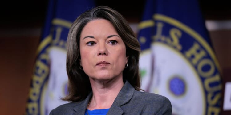 Rep. Angie Craig joins fellow Democrats for a news conference about the Republican efforts to pass a budget at the U.S. Capitol on May 6, 2025, in Washington, D.C.