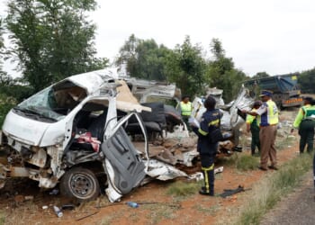 Police inspect the scene of a collision between a truck and a minibus carrying school children in Vanderbijlpark, South of Johannesburg, South Africa, on Jan. 19, 2026.