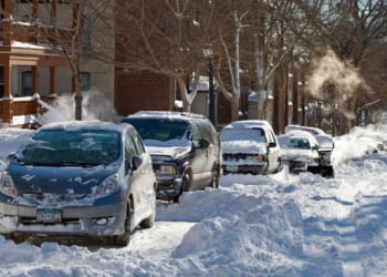 Snow covers a street in Minneapolis, Minnesota after a blizzard on Dec. 12, 2010.
