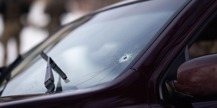 Looking at the rules for officers firing at a moving vehicle