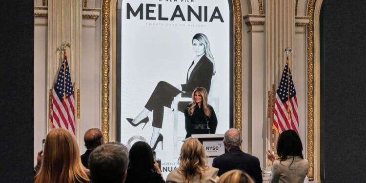 First lady Melania Trump delivers remarks promoting a new movie about her life in the New York Stock Exchange board room before ringing the opening bell, Wednesday.