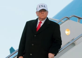 President Donald Trump walks down the air stairs after landing on Air Force One on Jan. 13, 2026, at Joint Base Andrews, Maryland.