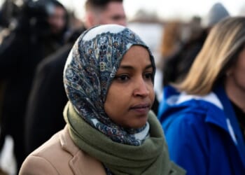 Rep. Ilhan Omar and Rep. Angie Craig arrive outside of the regional ICE headquarters at the Bishop Henry Whipple Federal Building on Jan. 10, 2026, in Minneapolis, Minnesota.