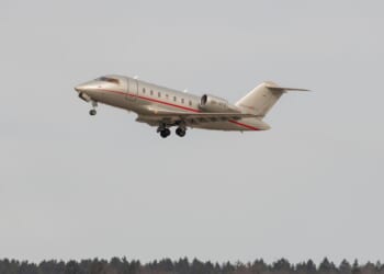A Bombardier CL-600-2B16 Challenger is taking off from a runway on Feb. 24, 2022, in Zurich, Switzerland.