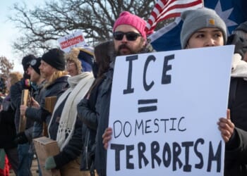 Demonstrators protest outside of the Bishop Henry Whipple Federal Building on Jan. 9, 2026, in Minneapolis, Minnesota.