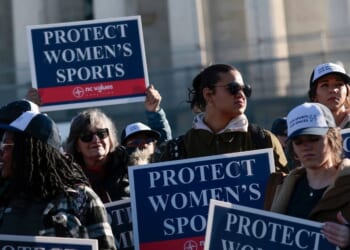 Protesters against transgender athletes competing in women's sports gather outside the Supreme Court on Jan. 13, 2026, in Washington, D.C.