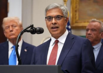 Director of the National Institutes of Health Jay Bhattacharya, joined by President Donald Trump and Health and Human Services Secretary Robert F. Kennedy Jr., delivers remarks during an announcement by President Donald Trump on “significant medical and scientific findings for America’s children” in the Roosevelt Room of the White House on Sept. 22, 2025, in Washington, D.C.