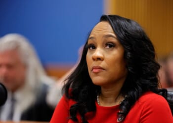 Fulton County District Attorney Fani Willis looks on during a hearing in the case of the State of Georgia v. Donald John Trump at the Fulton County Courthouse on March 1, 2024, in Atlanta, Georgia.
