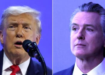 The brief encounter took place backstage while California Gov. Gavin Newsom, right, and President Donald Trump were attending the World Economic Forum's annual meeting this week in Davos, Switzerland.