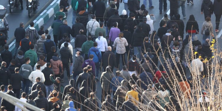 Volunteer member of Iran's Revolutionary Guard reportedly killed during widening protests