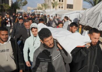 Israel strikes Gaza, killing 21 including women and children, after saying Hamas violated deal