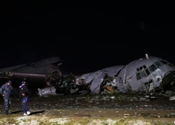 Bills scatter as cargo plane carrying money crashes in Bolivia, killing at least 15 people