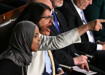 Democratic Rep. Rashida Tlaib of Michigan shouts while pointing a finger at President Donald Trump during Trump's State of the Union address in the Capitol on Tuesday.