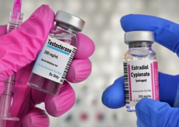 Vials of testosterone and estrogen for injection treatment.