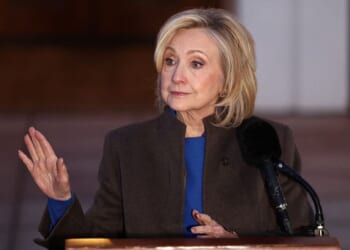 Former Secretary of State Hillary Clinton speaks to the news media Thursday after her deposition with the House Oversight Committee as they investigate links to convicted sex offender Jeffrey Epstein, in Chappaqua, New York. Clinton testified behind closed doors before a congressional committee investigating Epstein and his accomplice, Ghislaine Maxwell.