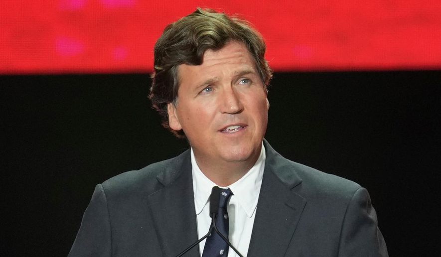 Tucker Carlson speaks at a memorial for Charlie Kirk, Sept. 21, 2025, in Glendale, Ariz. (AP Photo/Ross D. Franklin, File)