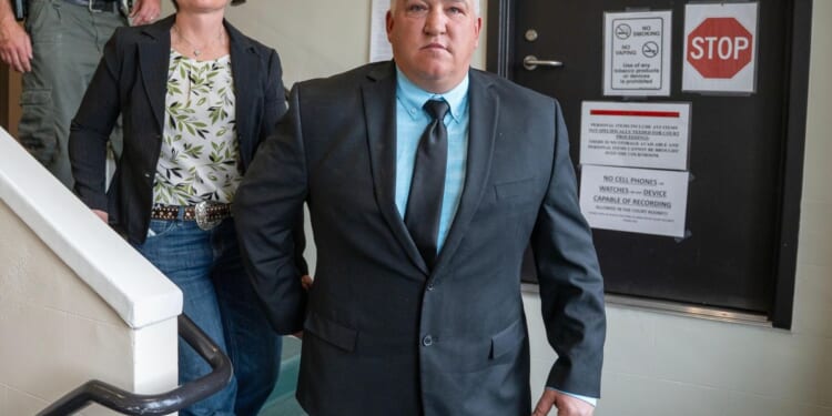 Wyoming man accused of taking wolf he hurt with snowmobile into bar changes plea to guilty