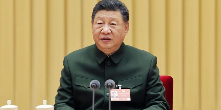 China’s Xi calls for political loyalty in the military as anti-corruption purge widens