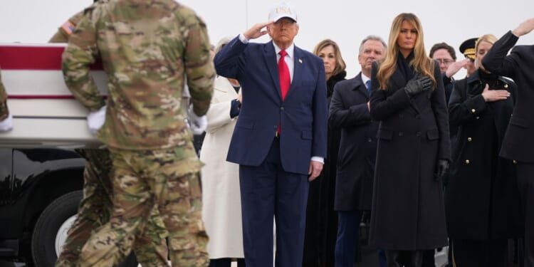 Trump grieves with families during return of soldiers killed in war in the Middle East