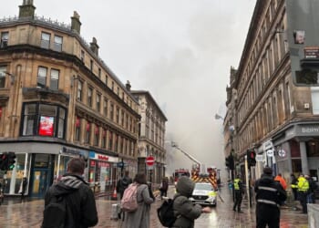 Glasgow building fire closes Scotland’s busiest train station and disrupts rail services