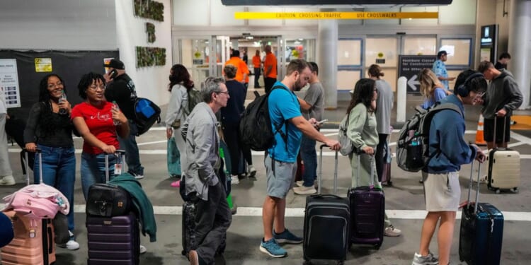 Long airport lines highlight concerns about unpaid security officers in the shutdown