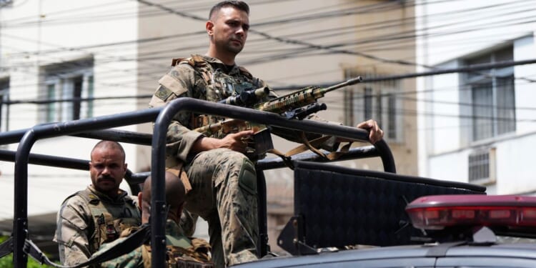 Brazilian police operation in Rio favelas leaves at least 8 dead, including local drug boss