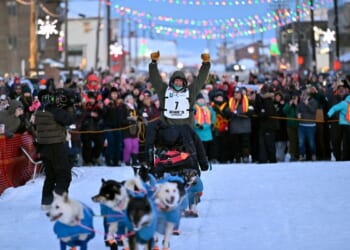 Former reality TV star Jessie Holmes repeats as champion of the grueling Iditarod sled dog race