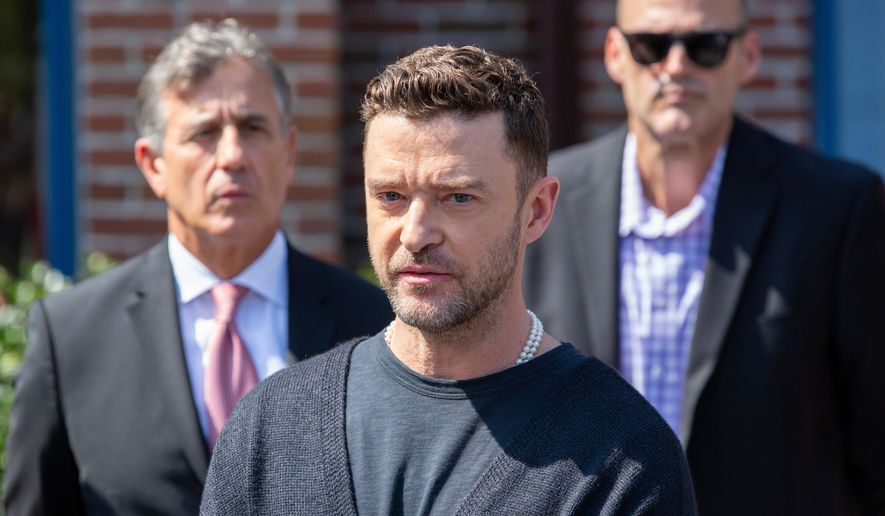 Justin Timberlake urges drivers not to get behind the wheel after even a single alcoholic drink in Sag Harbor, New York, Sept. 13, 2024, as part of his sentence for driving while impaired. (AP Photo/Ted Shaffrey, File)