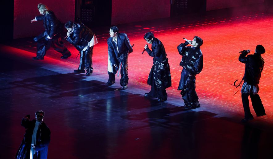 Kpop group BTS perform during 'BTS The Comeback Live Arirang' concert in central Seoul, South Korea, March 21, 2026. (Kim Hong-Ji/Pool Photo via AP)