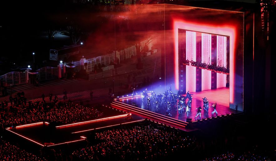 Kpop group BTS perform during 'BTS The Comeback Live Arirang' concert in central Seoul, South Korea, March 21, 2026. (Kim Hong-Ji/Pool Photo via AP)