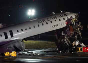 Pilot and copilot killed in collision between jet and fire truck at New York’s LaGuardia Airport