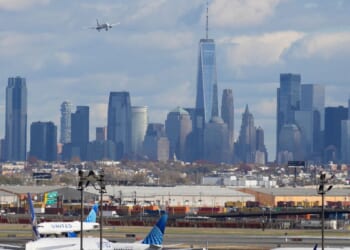 A burning smell forces Newark airport control tower evacuation, briefly halting flights