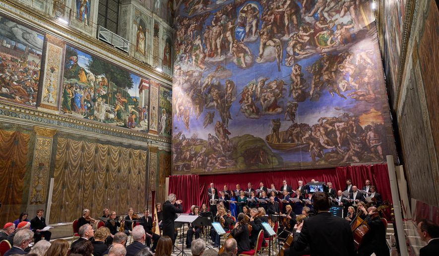 The Sixteen perform Angels Unawares byJames MacMillan, conducted by Harry Christopher in the Sistine Chapel at the Vatican, Sunday, March 22, 2026. (AP Photo/Domenico Stinellis)