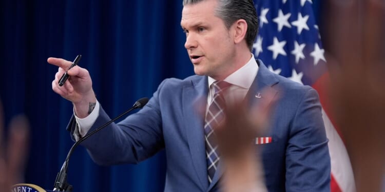 Pentagon spokesman says it will issue new press credentials but remove media offices