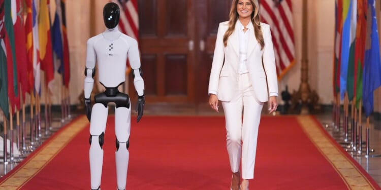 Robot walks the halls with Melania Trump for tech summit