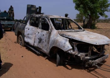 Militants in northern Nigeria kill 10 security forces and 1 resident, officials say