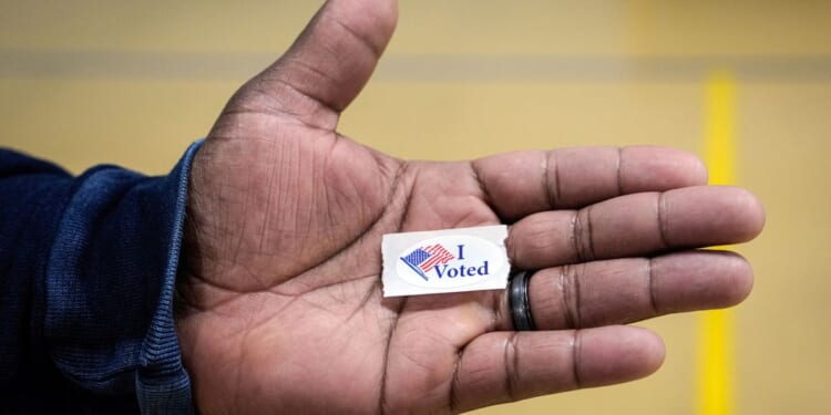 North Carolina’s photo voter ID mandate can continue as a judge upholds the law