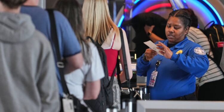 Trump signs memo to pay TSA workers as Congress deadlocks over funding