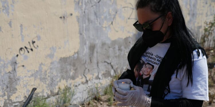 Mexico says a third of 130,000 missing people might be alive, fueling criticisms by families