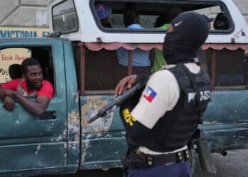 Central Haitian town descends into fire and bloodshed from gang warfare