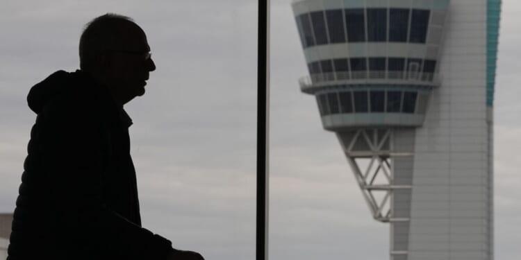 Some wait times at airport bottlenecks are easing with TSA paychecks promised