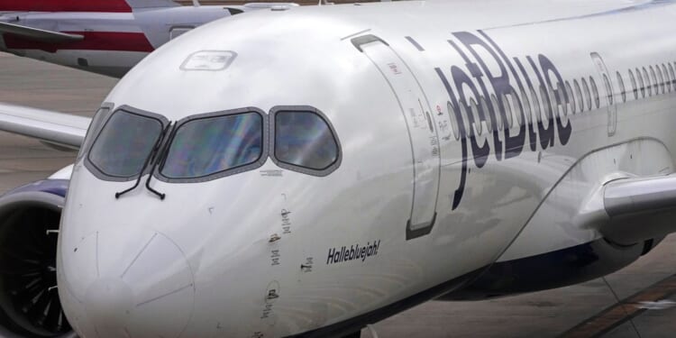 JetBlue raises its checked bag fees by as much as $9 as the Iran war affects fuel costs
