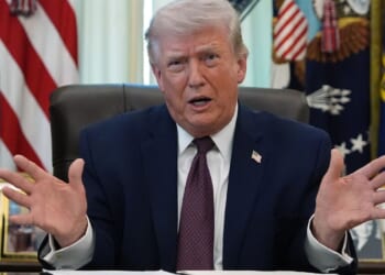 Trump signs order directing government to crack down on mail-in voting